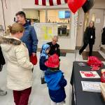 Mercer Island residents attend an open house at Fire Station 91 on Jan. 10 to meet firefighters, explore the station and learn about the citys Jan. 1 transition to a regional fire services model with Eastside Fire & Rescue (EF&R). Photo courtesy of the city of Mercer Island