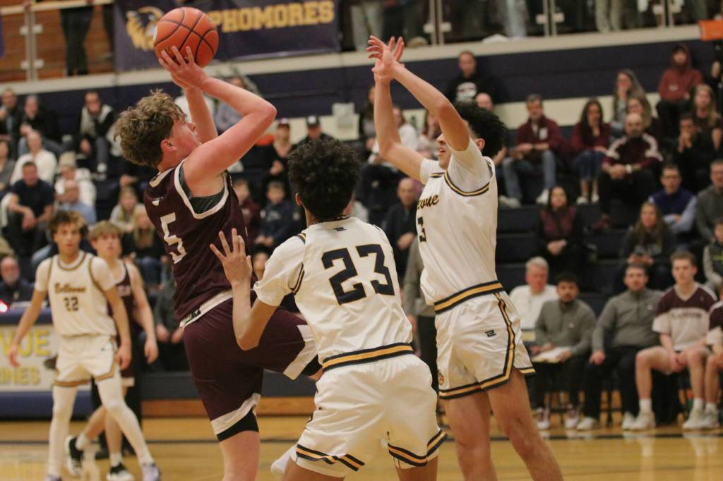 Mercer Island High Schools Ryan Boyle attacks the hoop against Bellevue High School on Feb. 5. Photo courtesy of Lis Larkin