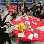 Students in the Mercer Island High School Education Coalition for Asian American Representation (ECAAR) presented a Taiwanese-inspired multi-cultural night market with food sold by local Asian-owned businesses, entertainment, merchandise, games and more on Feb. 11 in the school commons. Photo courtesy of the Mercer Island School District