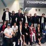 Mercer Island High School athletes and their coaches gather poolside at the recent 3A boys state swim and dive championships at the King County Aquatics Center in Federal Way. Courtesy photo