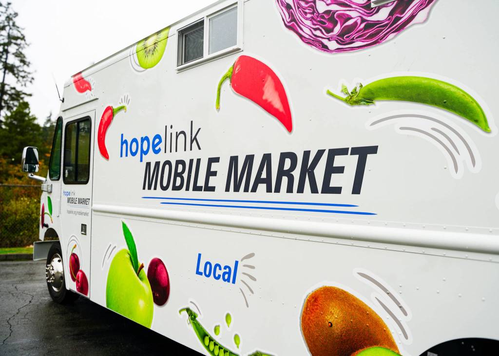 Hopelinks Mobile Market truck features free fresh and shelf-stable goods like vegetables, fruit, canned meats and soups, proteins, peppers, apples, pastas, rice and more. Photo courtesy of Hopelink
