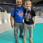 Mercer Islands Emerson Woods with coach Jess Torres at the Washington State Wrestling Folkstyle Championships on Feb. 18 at the Tacoma Dome. Woods notched the 121-pound middle school girls title. Courtesy photo