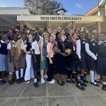 PETRI and Girls to Girls members stand in front of Taita-Taveta University, where they taught Kenyan high school scholars a science lab about cancer genes in elephants. Photo courtesy of Kimberly Miyazawa Frank