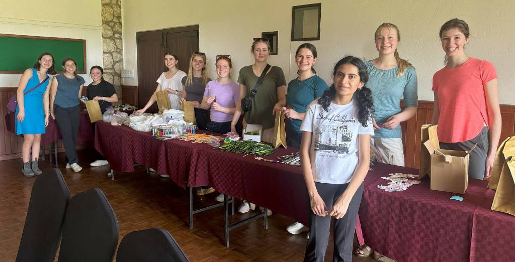 PETRI and Girls to Girls members assemble gift bags for Kenyan students. Photo courtesy of Kimberly Miyazawa Frank
