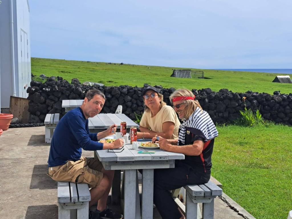 In Tristan Da Cunha, from left, Balthasar Wyss, Marcelo Osanai and Nina Pope sailboat captain Benno Frey. Courtesy photo