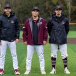 Left to right, Mercer Island High School (MIHS) varsity baseball head coach Chris Lawler and assistant coaches Keegan Ogard and Michael Petrie gather at the MIHS baseball alumni and fan appreciation night on April 4 at Island Crest Park. All are MIHS class of 2014 alums. Photo courtesy of Bernard Mangold