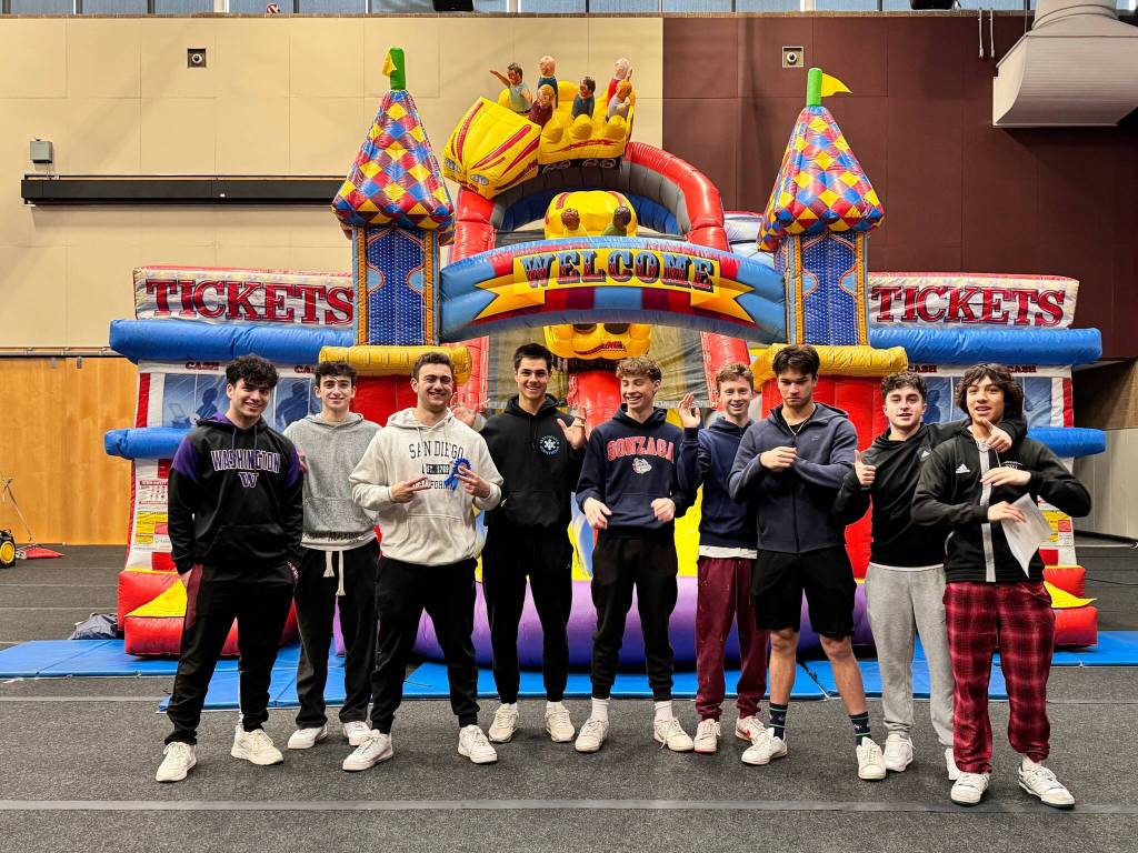 Mercer Island High School (MIHS) football volunteers. Other volunteers were: MIHS Key Club, MIHS Drama students, National Charity League Evergreen Chapter, Mercer Island Girl Scouts, Mercer Island Boy Scouts, Rotary, National League of Young Men and Miss Tiger from the Mercer Island Library. Volunteers from the community also included Steven Gerlock, Adele Parsons, Emily Fang, Anne House and Cameron Randall. Photo courtesy of Julie Day