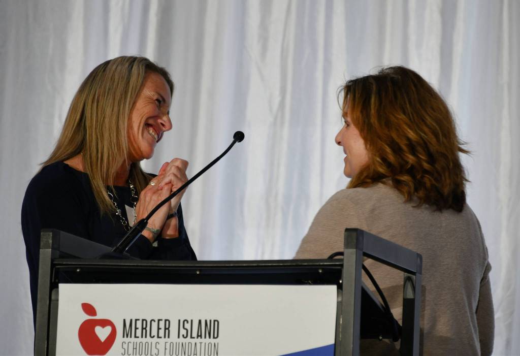 Mercer Island High School associate principal Erica Hill, left, presents Jordan Morriss Pathfinder Award to his mother, Leslie. Andy Nystrom/ staff photo