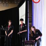 Mercer Island High School robotics students Amelia Bernson, Arthur Huang and Joshua Yeh launch an orange ring during their presentation. Andy Nystrom/ staff photo