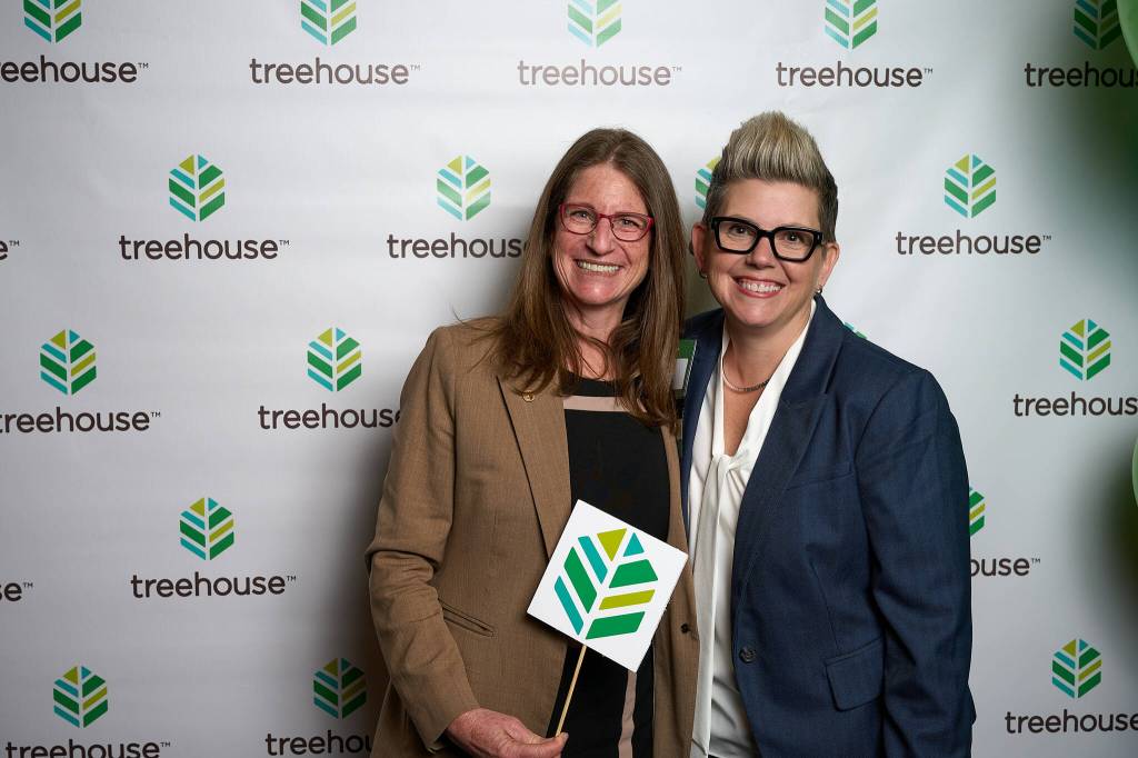 Rep. Tana Senn of Mercer Island, left, with Dawn Rains, CEO of Treehouse, at the nonprofits luncheon on April 23 in Seattle. Courtesy photo