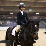 Mercer Island High School sophomore Gabby Frederick, 15, (pictured in the center) won the varsity equitation on the flat competition in her age group  which included high school seniors  at the Interscholastic Equestrian Association (IEA) National Finals from April 25-28 at the Tryon International Equestrian Center in Mill Spring, North Carolina. She also won an Intermont Equestrian At Emory & Henry $5,000 equestrian scholarship and her second sportsmanship award, which was voted on by her peers. Courtesy photo