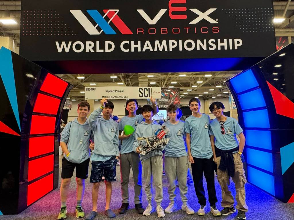 From left to right: Islander Middle School Slippery Penguin eighth-grade robotics team members are Zevi Danielli, Henry Xing, Brian Kwon, Harry Nguyen, Til Wyss, Kenan Khatib and Jeremy Leung. Photo courtesy of CJ Nguyen