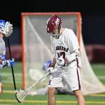 Mercer Island High School senior boys lacrosse captain Dylan Shobe clenches his fist after scoring a goal against Seattle Prep. Photo courtesy of Jim Jantos