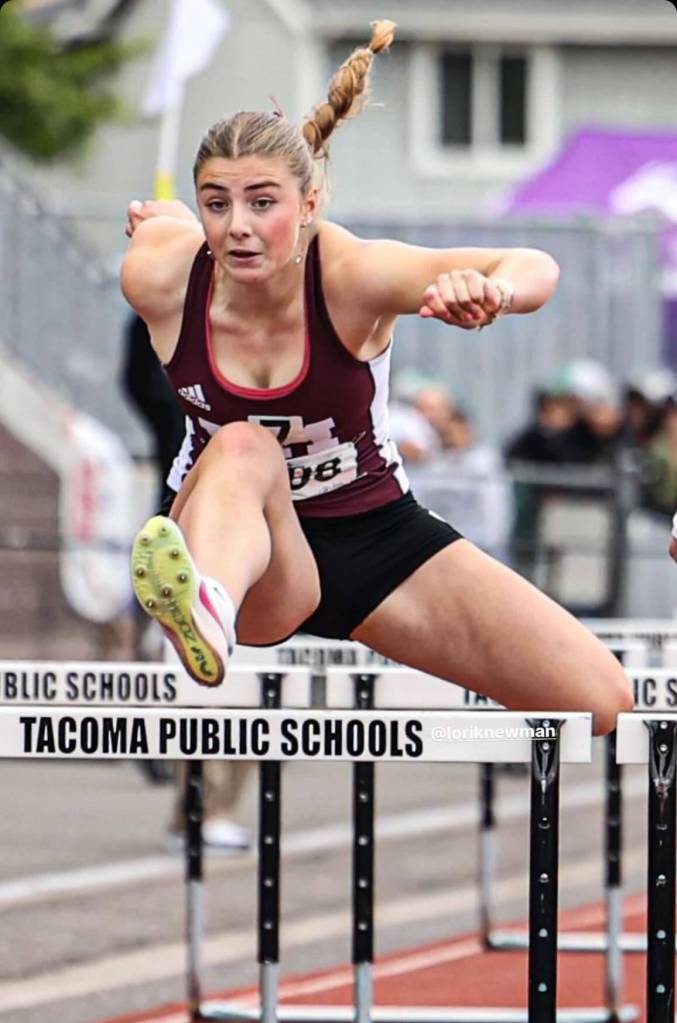 Mercer Island High Schools Eloise Newman hurdles her way to the 100 title at the 3A state championships. Photo courtesy of Scott Knoblich