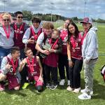 Mercer Island High Schools Unified Sports co-ed soccer team at the May 25 state championship game. From left to right: (Top) coach Jeniffer Blaser, Aaron Yang, Cortez Smith, Taven Glennon-Mulein, Madox Mulein (not on team), Jordan Balousek, Hayley Nguyen and coach Jamie Glennon. (Bottom) Gavin Fukano and Yura Vaganov. Photo courtesy of Janelle Brin