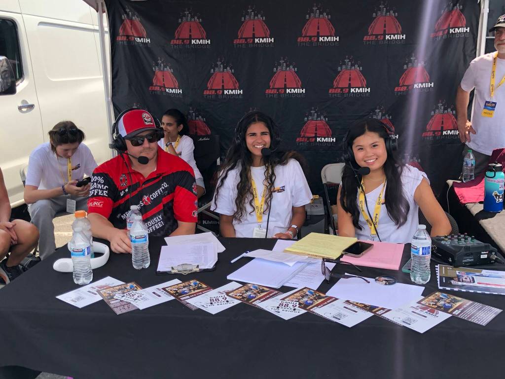 Courtesy photo
KMIH 88.9 The Bridge student broadcasters Hayley Nguyen and Aaliyah Khan chat with MissMercury.com unlimited hydroplane driver Jamie Nilsen for the Mercer Island High Schools Log Boom Radio broadcast during Seafair weekend from Genesee Park near Lake Washington.