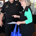 Mercer Islander Sue Stewart chats with new Mercer Island Police Department Chief Chris Sutter at National Night Out on Aug. 6 at the Mercer Island Community and Event Center. Andy Nystrom/ staff photo
