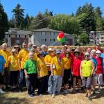 As the Paris Olympics were underway, more than 74 resident and employee athletes from Covenant Living at the Shores on Mercer Island recently participated in their own summer games. The events were a way for individuals at the senior living community to stay active through in a bit of friendly competition. Those events included cycling, swimming in Lake Washington, archery, javelin throw, volleyball and golf. To add to the theme, resident Peter Kennedy shared his experience of competing in figure skating during the winter games in 1948 and 1952 in Switzerland and Norway. He donned his original Olympic team coat during his presentation. Peter and his sister Karol Kennedy won a silver medal in the 1952 winter games. Courtesy photo