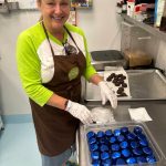 Ann Peterson wraps Pretzel Thingies at Island Treats on Aug. 28. Andy Nystrom/ staff photo