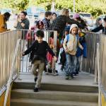 Northwood Elementary students walk through the main gate on their way to classes on the first day of school on Aug. 28. Andy Nystrom/ staff photo