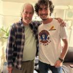 Little Feat keyboardist Bill Payne visits with Mercer Island High School senior Sam Paddor. Courtesy photo
