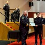 Luke Bonagofski, second from right, was sworn in by Mercer Island Police Department Chief Chris Sutter as the newest member of the department. The swearing-in ceremony took place immediately following graduation exercises at the Criminal Justice Training Center in Burien on Aug. 29. Officer Bonagofski received the highest award for academic achievement in the five-month program that included 29 candidates. Photo courtesy of Greg Asimakoupoulos