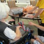 Thirty students from Mercer Islands French American School of Puget Sound (FASPS) recently visited Covenant Living at the Shores on Mercer Island skilled nursing residents. The-eighth graders pair up with residents for conversation and to provide fun while participating in enriching activities. The students play games, bring greeting cards and exchange goodie bags. This intergenerational program between Covenant Living and FASPS started in 2017 as a way to unite the different generations. The visits enrich participants lives and demonstrates that the young and older adults have a lot to offer each other in their communities. Courtesy photo