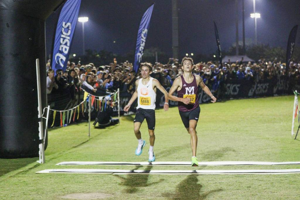 Mercer Island High Schools Owen Powell, right, inches out Josiah Tostenson of Oregon on Sept. 21 at the Woodbridge Cross Country Classic in Irvine, California. Photo courtesy of Ken Martinez, westcoastxc