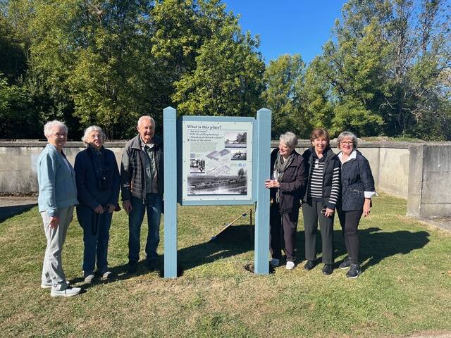Members of the boards of the Mercer Island Historical Society and the Friends of Luther Burbank gather on Sept. 30 at the installation of a new sign explaining the ruins of the old milk barn that was part of the Luther Burbank School. They are, left to right, Marcia Zervis, Judith Roan, Einer Handeland, Terry Moreman, Jane Meyer Brahm and Sue Stewart. The two organizations paid for the sign and the work of the designer, James Englehardt, who couldnt be present for the unveiling of the sign. Also missing were Susan Blake and Sandy Maloof. Courtesy photo
