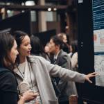 Attendees check out an information board at the Rivkin Centers 15th Biennial Ovarian Cancer Research Symposium, which took place on Sept. 20-21 at the Seattle Airport Marriott. Photo courtesy of Vivian Hsu Photography