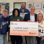 From left to right: Rick Rizzs, LeAsia Lane, Trent Henderson, Brett Alston and Nancy Henderson. Photo courtesy of the Mercer Island School District