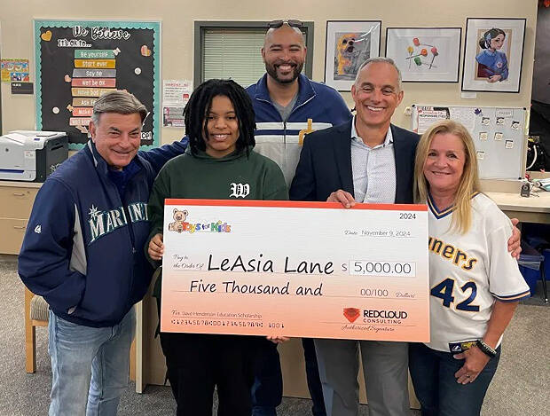 From left to right: Rick Rizzs, LeAsia Lane, Trent Henderson, Brett Alston and Nancy Henderson. Photo courtesy of the Mercer Island School District