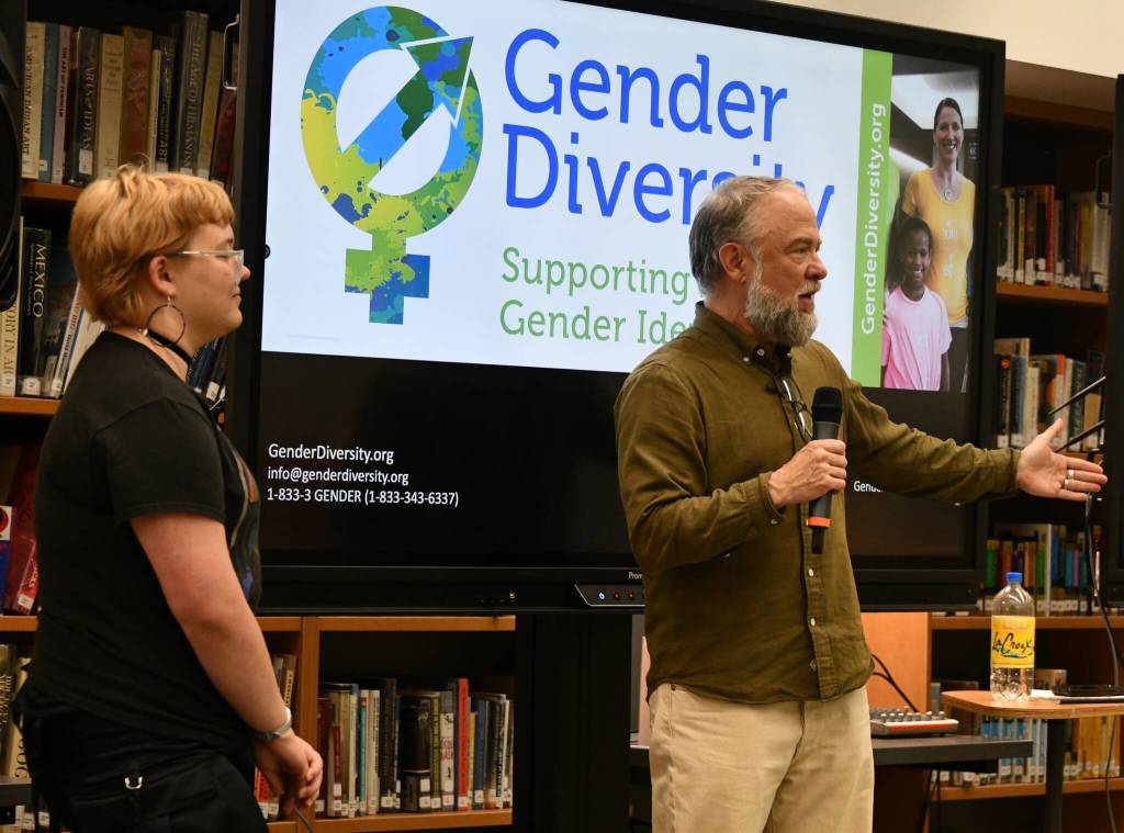 Nick Kangas, left, and Aidan Key speak at the Understanding the Needs of Transgender Youth presentation on Oct. 10 in the Mercer Island High School library. Andy Nystrom/ staff photo