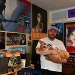 Volver Records owner John Packer cradles his corgi Sophie on a recent day at the store. Andy Nystrom/ staff photo