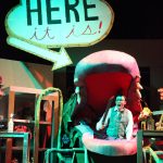 Kyle Gerstel sits inside the carnivorous plant Audrey II during a full dress rehearsal of the Mercer Island High School Drama departments production of Little Shop of Horrors. Photo courtesy of Alec Chvany