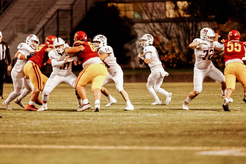 Mercer Island High School quarterback Youngmin Lee drops back to pass against ODea High School on Nov. 15 at Seattles Memorial Stadium. Photo courtesy of Linda Kercher