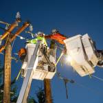 Puget Sound Energy employees work to restore power. Photo courtesy of Puget Sound Energy