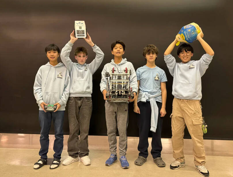 Mercer Island High Schools freshman VEX Robotics Team, the Slippery Penguins, won the championship title on Nov. 23 at the annual Lake Stevens Turkey Trot Invitational Tournament. The team (10-2 overall at the event) overcame power outages, and the teams hard work under flashlight conditions at times paid off with a trophy and a fresh turkey prize for Thanksgiving. They dominated the knockout stage with a 4-0 record, including a rematch in the final. The team of Harry Nguyen (captain), Til Wyss, Henry Xing, Zevi Danielli and Jeremy Leung were among the top 32 Washington high school teams competing at Cavelero Mid High School in Lake Stevens. Photo courtesy of the Mercer Island School District