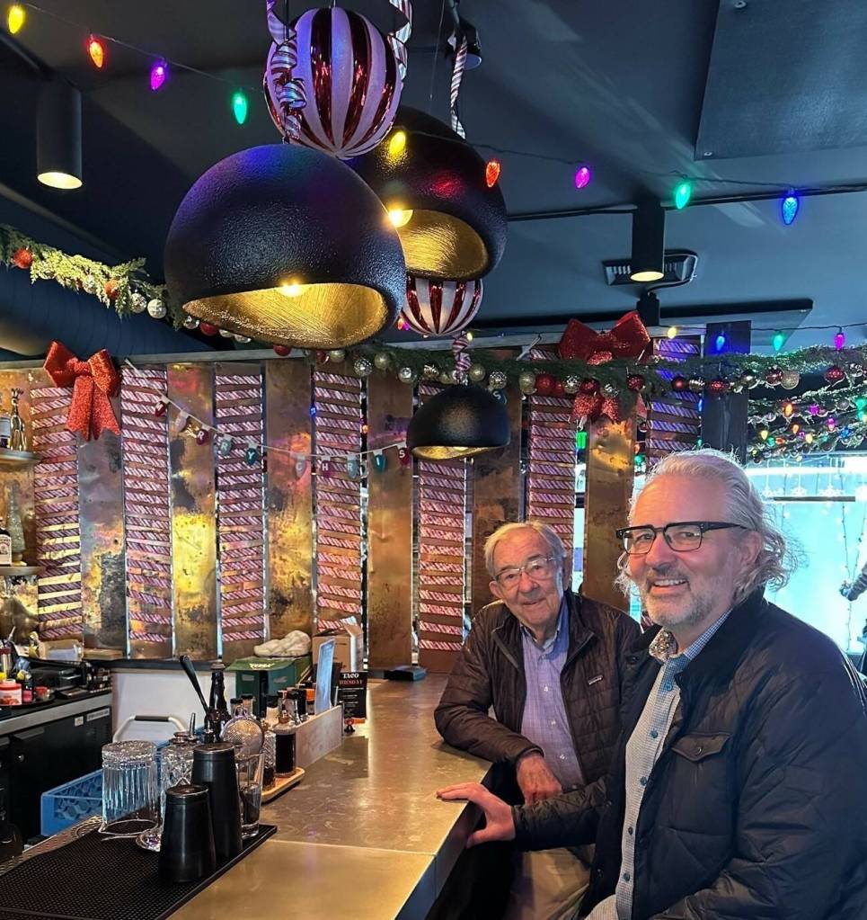 Victor and Vidmantas Raisys visit The Crawlspace Gastropub during one of their weekly father-and-son outings. Photo courtesy of Laurie Raisys