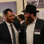 Northwest Yeshiva High School Head of School Rabbi Yehuda Gabay, left, speaks with Rabbi Chaim Rivkin at the gala. Andy Nystrom/ staff photo