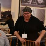 Northwest Yeshiva High School President Rachel Rosenfeld chats with an attendee at the gala. Andy Nystrom/ staff photo