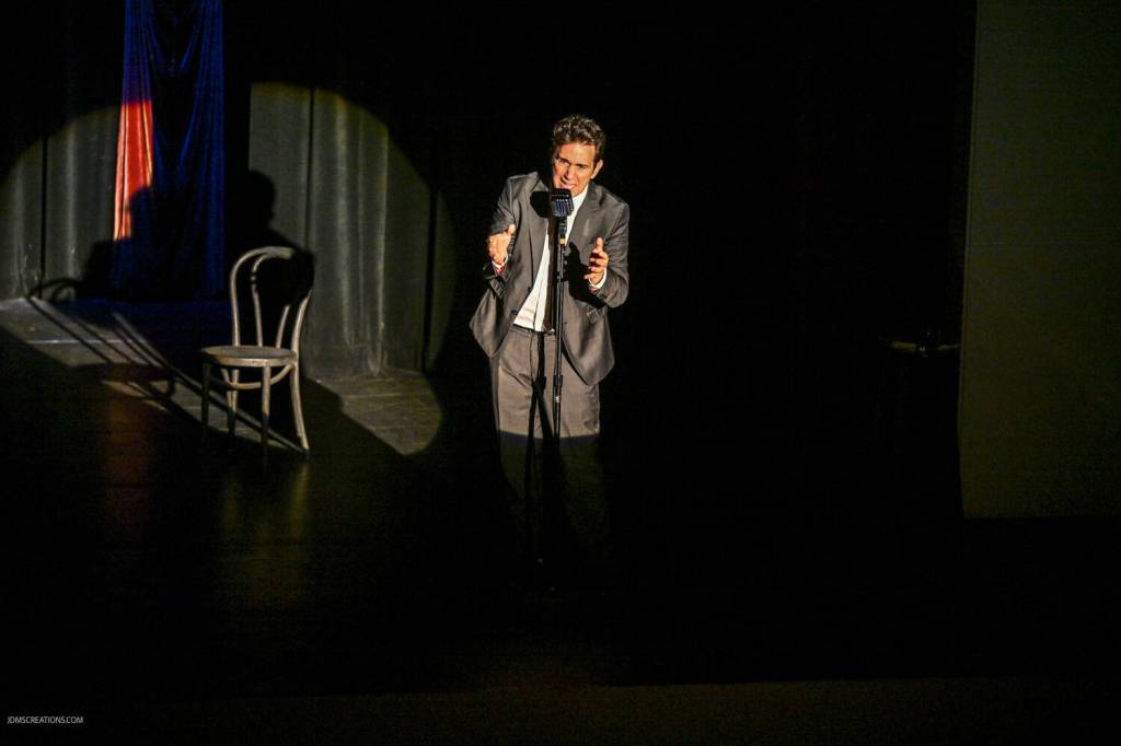Ronnie Marmo commands the stage in the one-man theatrical performance of Im Not A Comedian… Im Lenny Bruce on Dec. 8 at the Stroum Jewish Community Center on Mercer Island. Photo courtesy of John Shaffer