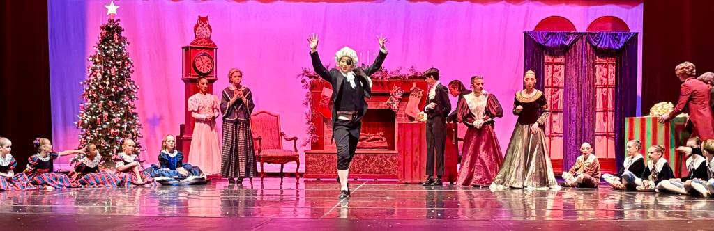Karoleina Luu bewitches the party as Herr Drosselmeyer. Photo courtesy of Susie Vannatter