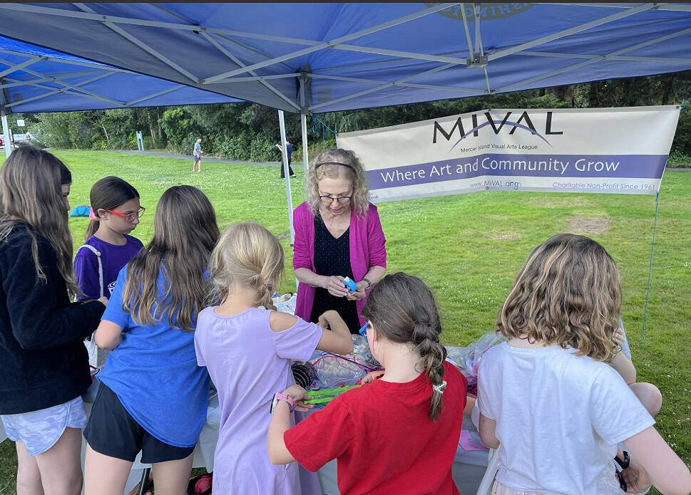 Mercer Island Visual Arts League (MIVAL) hosts a kids artmaking table at Mostly Music in the Park summer concerts. Photo courtesy of MIVAL
