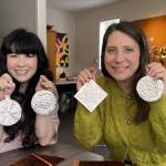 Community members Nicole Benson and Lynette Dufton enjoy a metal embossing class at MIVAL Studio. Photo courtesy of MIVAL