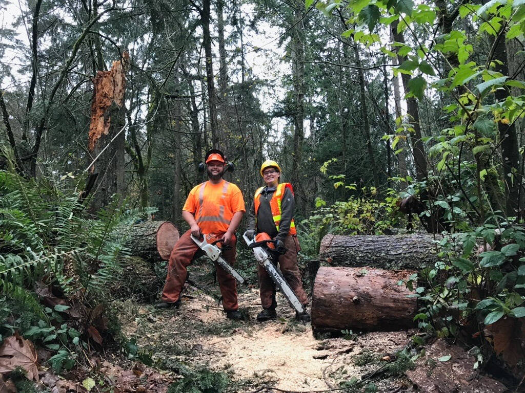 At its Jan. 20 meeting, Mercer Islands Open Space Conservancy Trust Board recognized city staff for its dedication to local parks following the bomb cyclone storm on Nov. 19, 2024, as well as later storms this winter. The board observed the difficult conditions under which the city staff  including Tyler Shaw and Jenni Gregg (pictured)  worked to quickly restore Pioneer Park, its trails and trail system. Photo courtesy of the city of Mercer Island