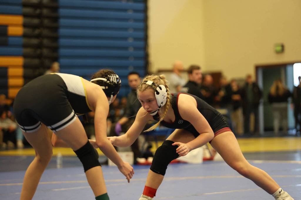 Mercer Island High School wrestler Emerson Woods, right, captured gold at the recent Wolverine Scuffle hosted by Bellevue High School. Photo courtesy of the Mercer Island School District