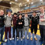 Mercer Island High School wrestlers and coaches gather at the recent Wolverine Scuffle hosted by Bellevue High School. From left, Assistant coach Colton Knebel, Max Martin, Jordan Benitez, head coach David Woo, Gordon Gibson, Chase Warnick and assistant coach Chris Pothoven. Courtesy photo