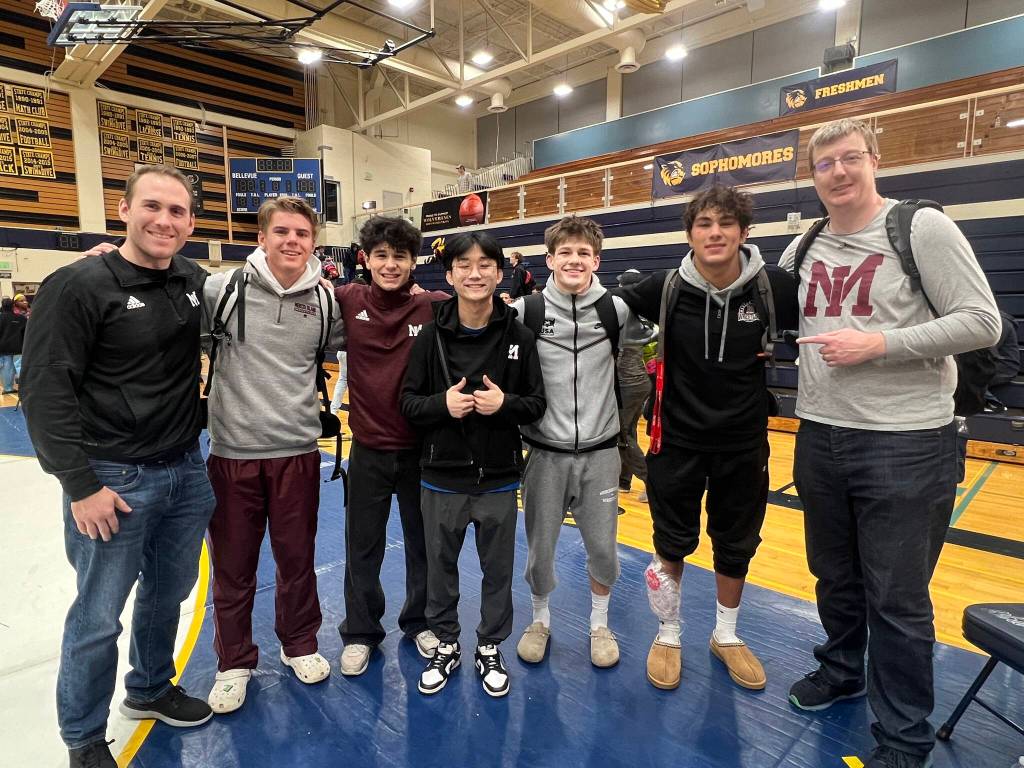 Mercer Island High School wrestlers and coaches gather at the recent Wolverine Scuffle hosted by Bellevue High School. From left, Assistant coach Colton Knebel, Max Martin, Jordan Benitez, head coach David Woo, Gordon Gibson, Chase Warnick and assistant coach Chris Pothoven. Courtesy photo