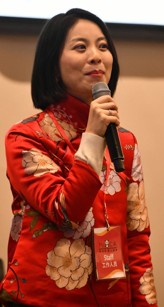 Fan Yuan, president of the Mercer Island Chinese Association, greets the crowd. Andy Nystrom/ staff photo